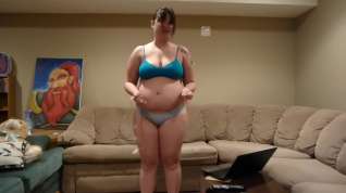 Online film Chubby Asian showing off weight gain and measuring.