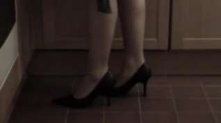 Online film Black heels on kitchen
