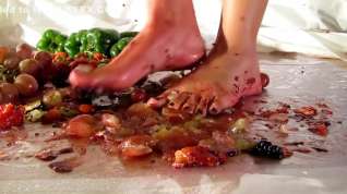 Online film Crushing grapes, crackers, and peppers barefoot