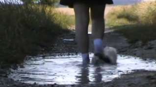 Online film Muddy White Socks and Puddles