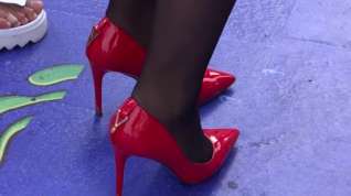 Online film Black nylon and red heels