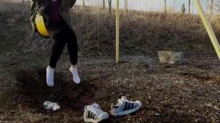 Online film Playing on the Swing with Adidas Superstars and water