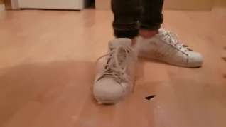 Online film Stepping & Spitting In Well Worn White Adidas Trainers and Gold Boots