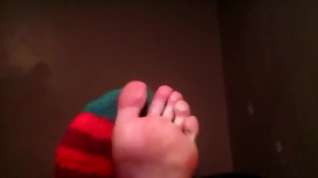 Online film Fuzzy Christmas Socks and Bare feet