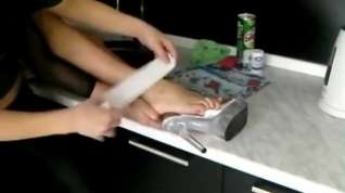 Online film Two Girls Damaging and Bandaging Each Other's Foot in the Kitchen