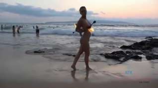 Online film Jade Nile as a naked Firedancer in Hawaii.