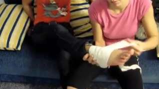 Online film 2 Girls with 3 Injured Feet Wrapped in Bandage and Wearing Flats