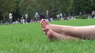 Online film Brown hair model relaxes at the park 4/4