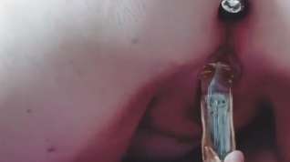 Online film Chubby wearing butt plug fucks herself with glass dildo