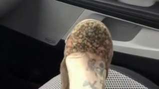 Online film Shoeplay with flats in car
