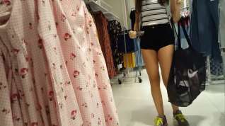 Online film Candid voyeur teen in cheeky shorts clothes shopping