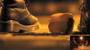 Online film POV crushing of capsicum in shiny Doc Martens combat boots