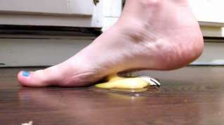 Online film Raw egg crushed under barefeet in slow motion!