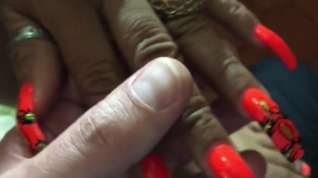 Online film Latina with sexy long orange(different design) nails