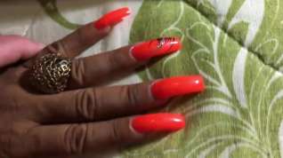 Online film Latina with sexy long orange nails fingernails