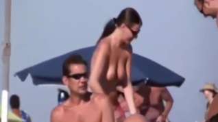 Online film a couple masturbates on nudist beach