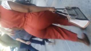 Online film Older Lady With A Phatty In Orange Outfit.