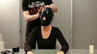 Online film Gagged, taped, hooded and encased