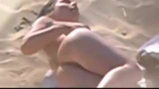 Online film Nude beach - hot brunette plays for voyeur