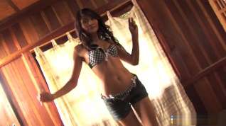 Online film Striking Asian babe Bella Yong peels off her sexy outfit by the window