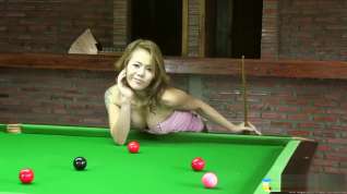 Online film Busty Kate makes some shots on the pool table as she strips and poses