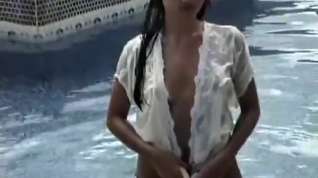 Online film Satomi shows you all her good features while strolling in the pool