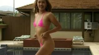 Online film Sexy slim chick Kyoko sensually performs for the camera by the pool