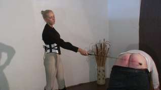 Online film slave gets caned by strict blonde mistress