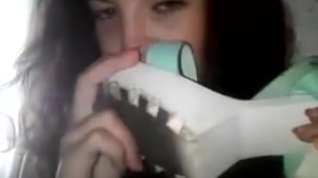 Online film Brunette smelling her sexy shoe