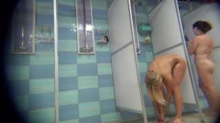 Online film Spying on a tanned blonde with tight body in the shower.