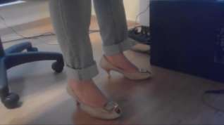 Online film Candid heels under table in office 1