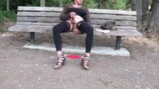 Online film Lovely crossdresser jerks it on a park bench