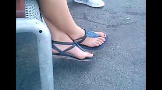Online film Candid feet in sandals closeup waiting