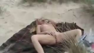 Online film Blonde has sex with strangers on a beach