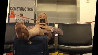 Online film Blond spying feet in airport sexy