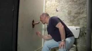 Online film Cocksucker in action at glory hole with BIG uncut cock