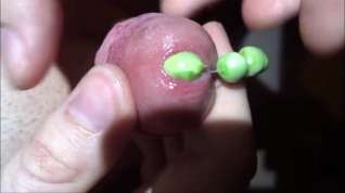 Online film Cumshot with peas in urethra