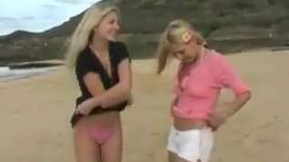 Online film Two lesbians puts on a show for the boys on a beach!