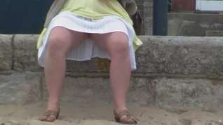 Online film Wife showing red crotchless panties on the pier at Swanage.