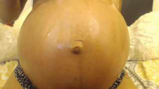 Online film Oiled Preggo Belly