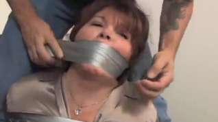 Online film Two milfs taped up in the office