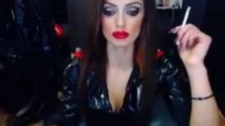 Online film Sexy dom in latex smoking on cam