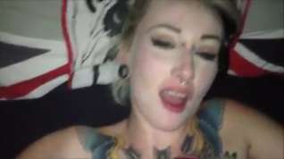 Online film Tattooed chick takes a facial.