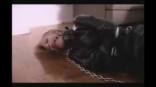 Online film Slave in straitjacket chained struggles to door