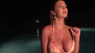 Online film Ellis Attard reveals her juicy tits in the pool