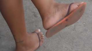 Online film Candid ebony feet soles dangling in bus stop