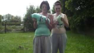 Online film Two hot babes with big belly's do the milk challenge...