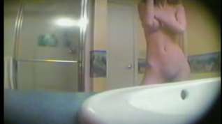 Online film Hidden cam filmed a busty amateur girl in the bathroom