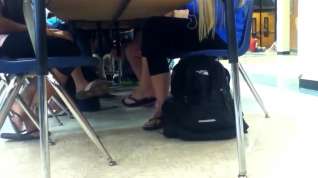 Online film Girls dangling flip flops during lunch 2