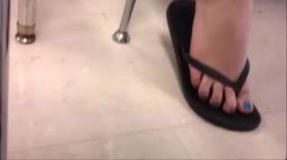 Online film candid flop flops blue toes up close shoeplay